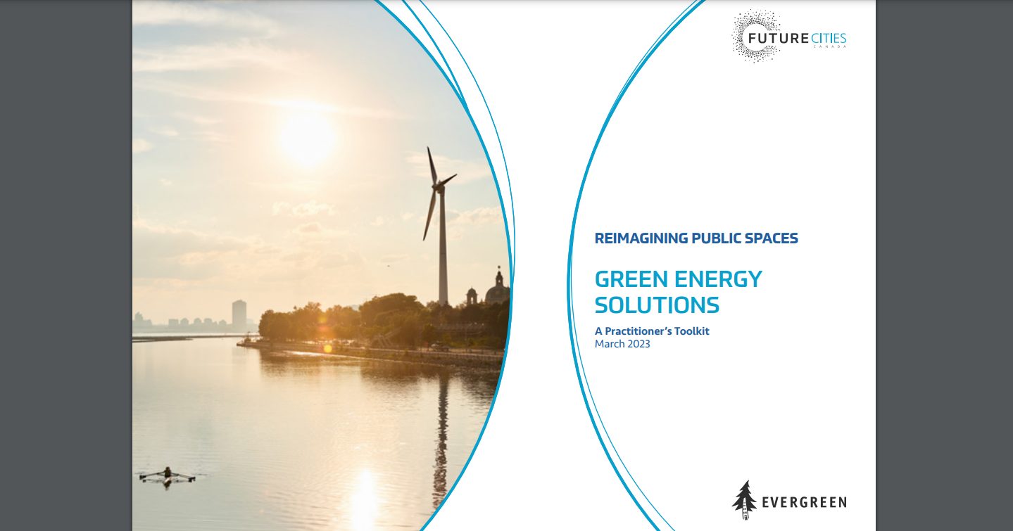cover of the green energy toolkit featuring a wind turbine on a lake setting